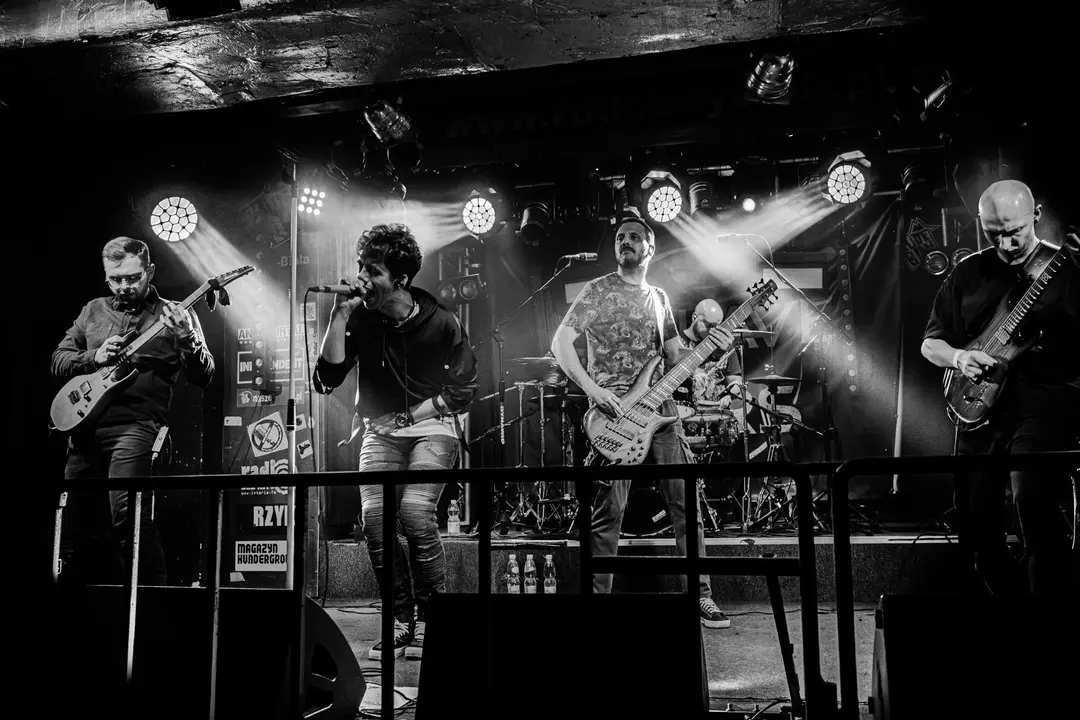 Black and white live photo of Enslave Them Stars on stage at Rudeboy Club in Bielsko-Biala.